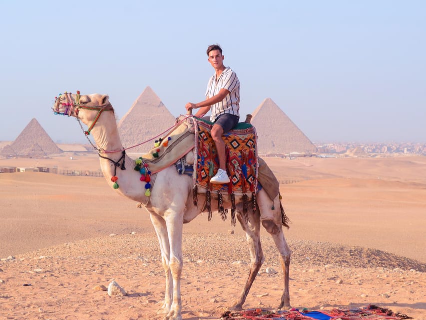 Day Tour To Giza Pyramids with Camel Ride and Egyptian Museum in Cairo